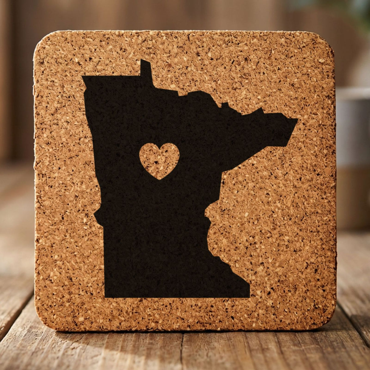 Minnesota square cork coaster engraved with the state shape and a heart