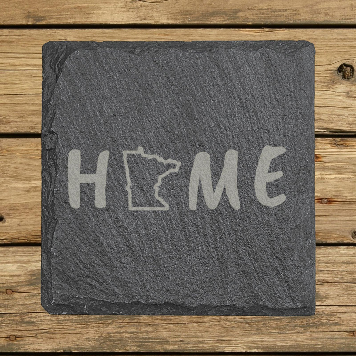 Minnesota square slate coaster engraved with HOME using the state outline as the letter O