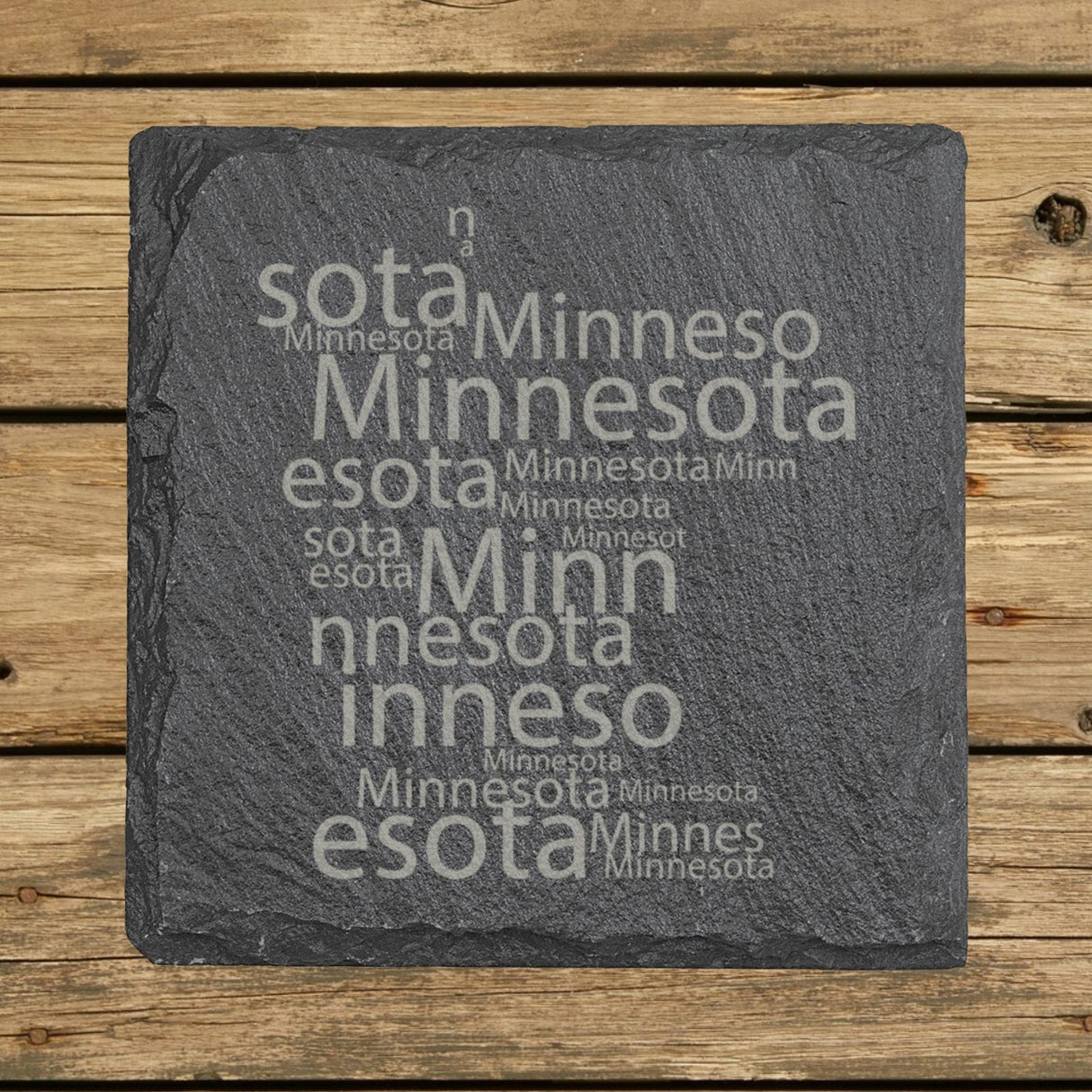 Minnesota square slate coaster engraved with a word cloud of repeating Minnesota text