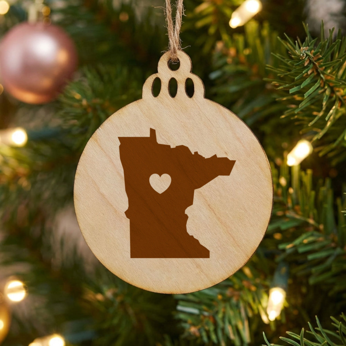 Minnesota round wood Christmas ornament engraved with the state shape and a heart