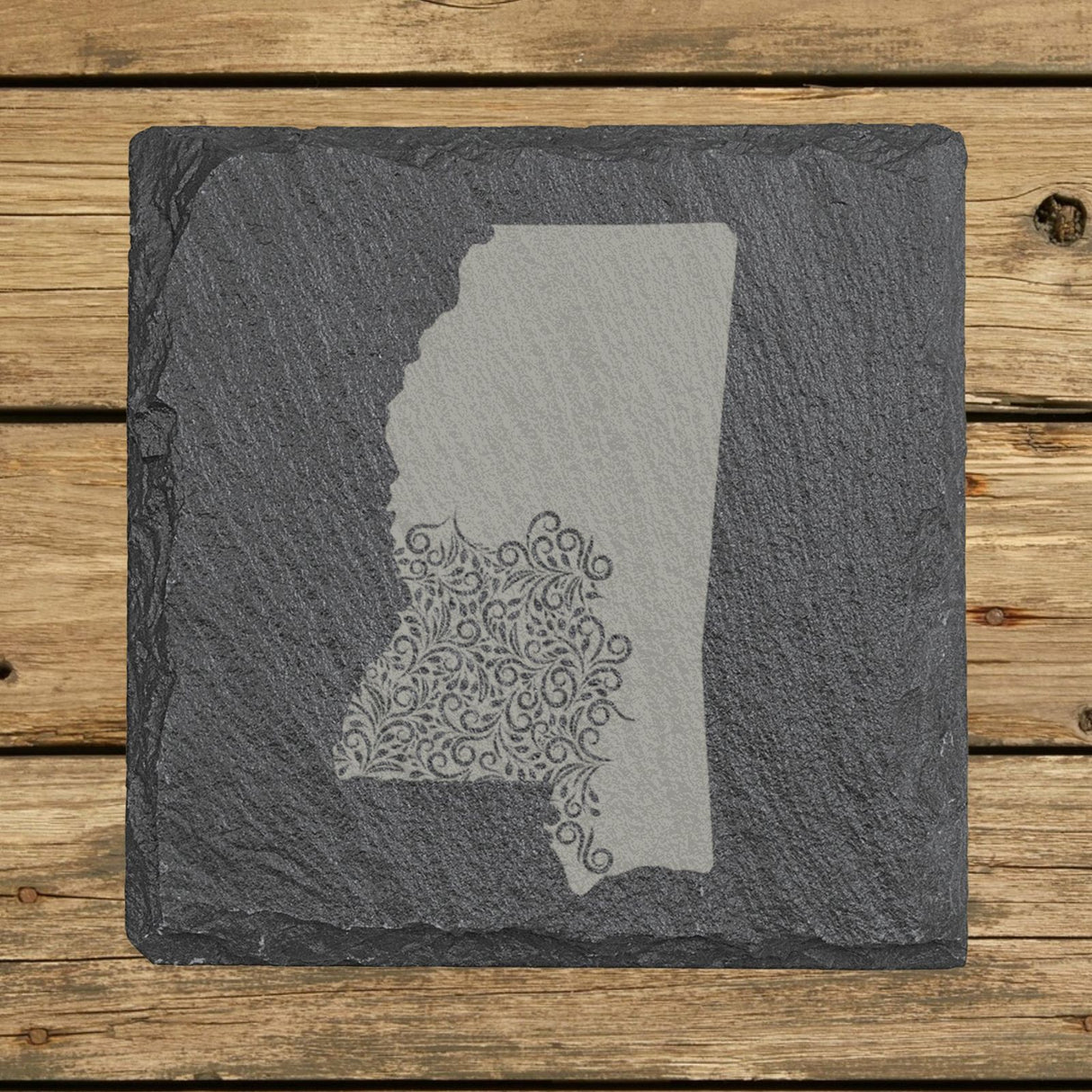Mississippi square slate coaster engraved with the state shape in ornate floral scrollwork