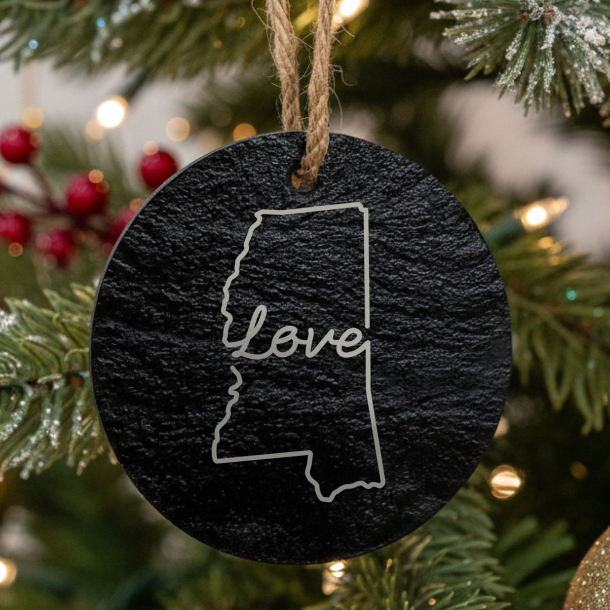 Mississippi round slate Christmas ornament engraved with a hand-drawn state outline and love in cursive