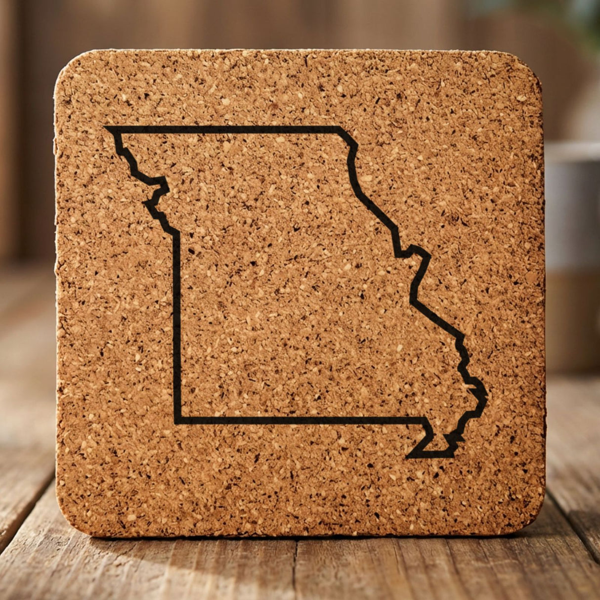 Missouri square cork coaster engraved with a clean state outline