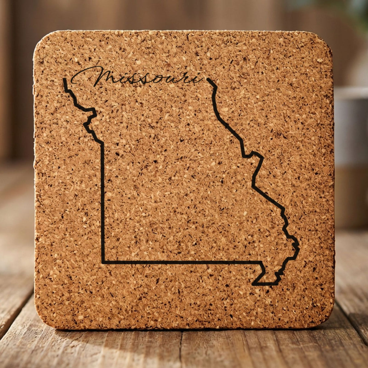 Missouri square cork coaster engraved with the state outline and Missouri in script lettering