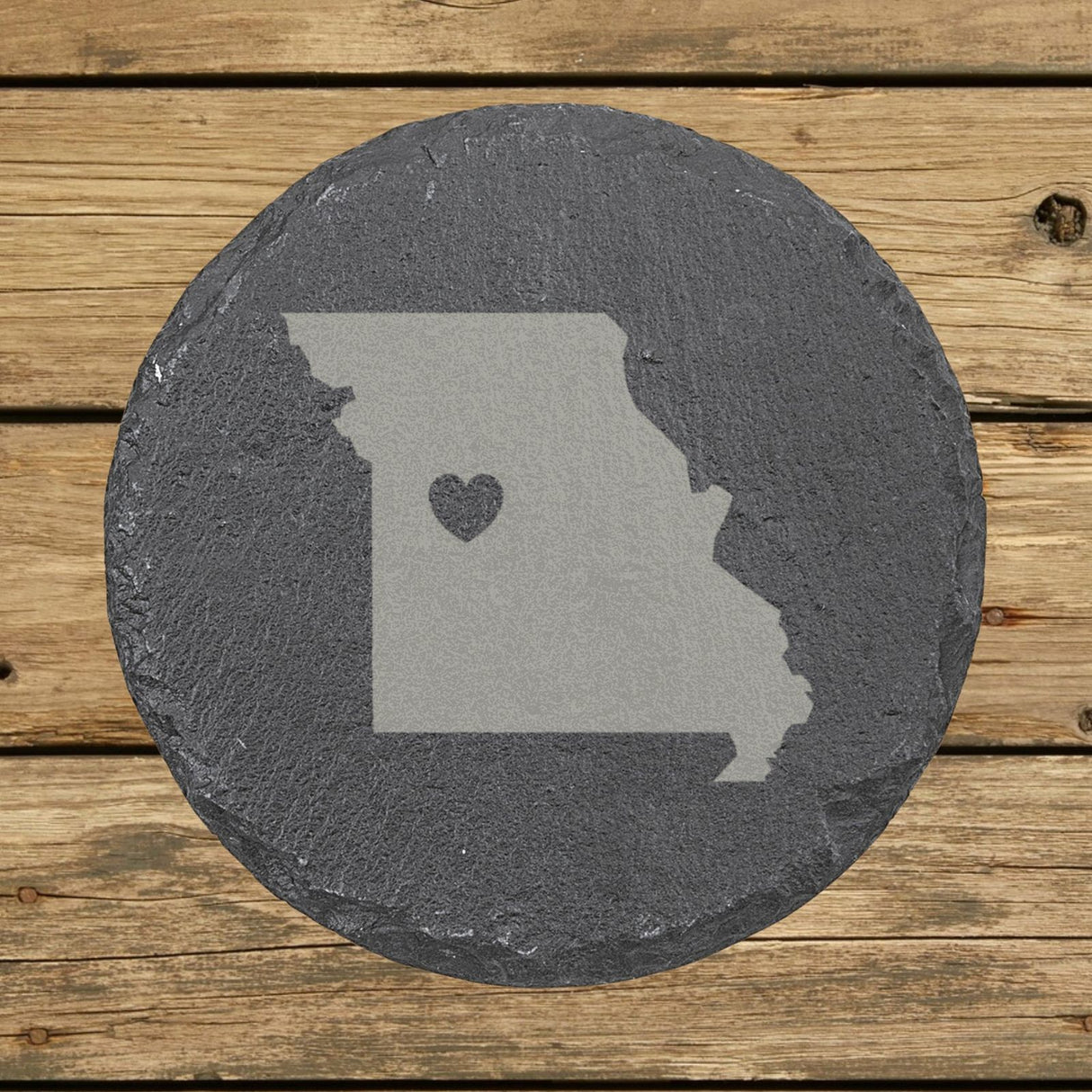Missouri round slate coaster engraved with the state shape and a heart