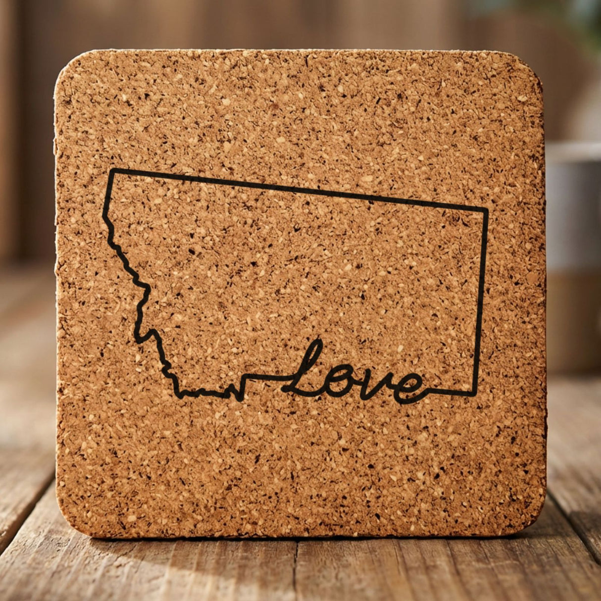 Montana square cork coaster engraved with a hand-drawn state outline and love in cursive