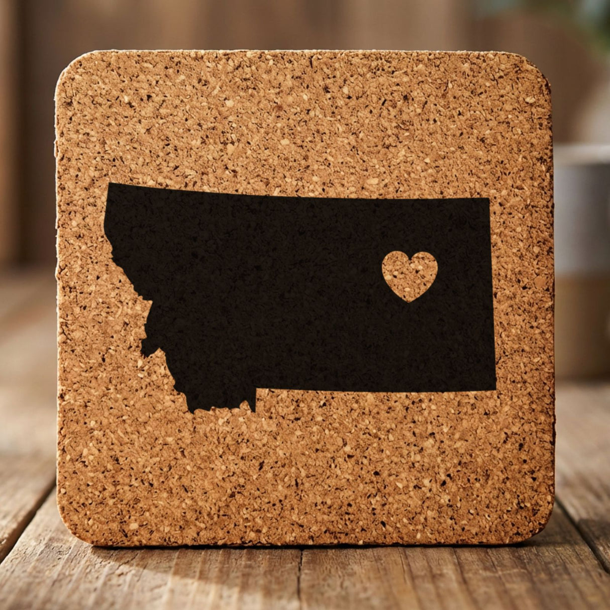 Montana square cork coaster engraved with the state shape and a heart