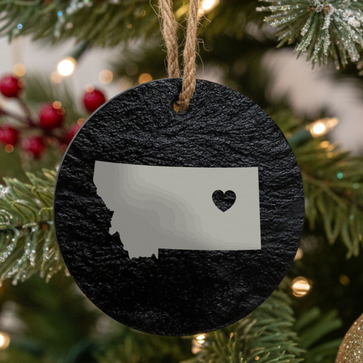 Montana round slate Christmas ornament engraved with the state shape and a heart