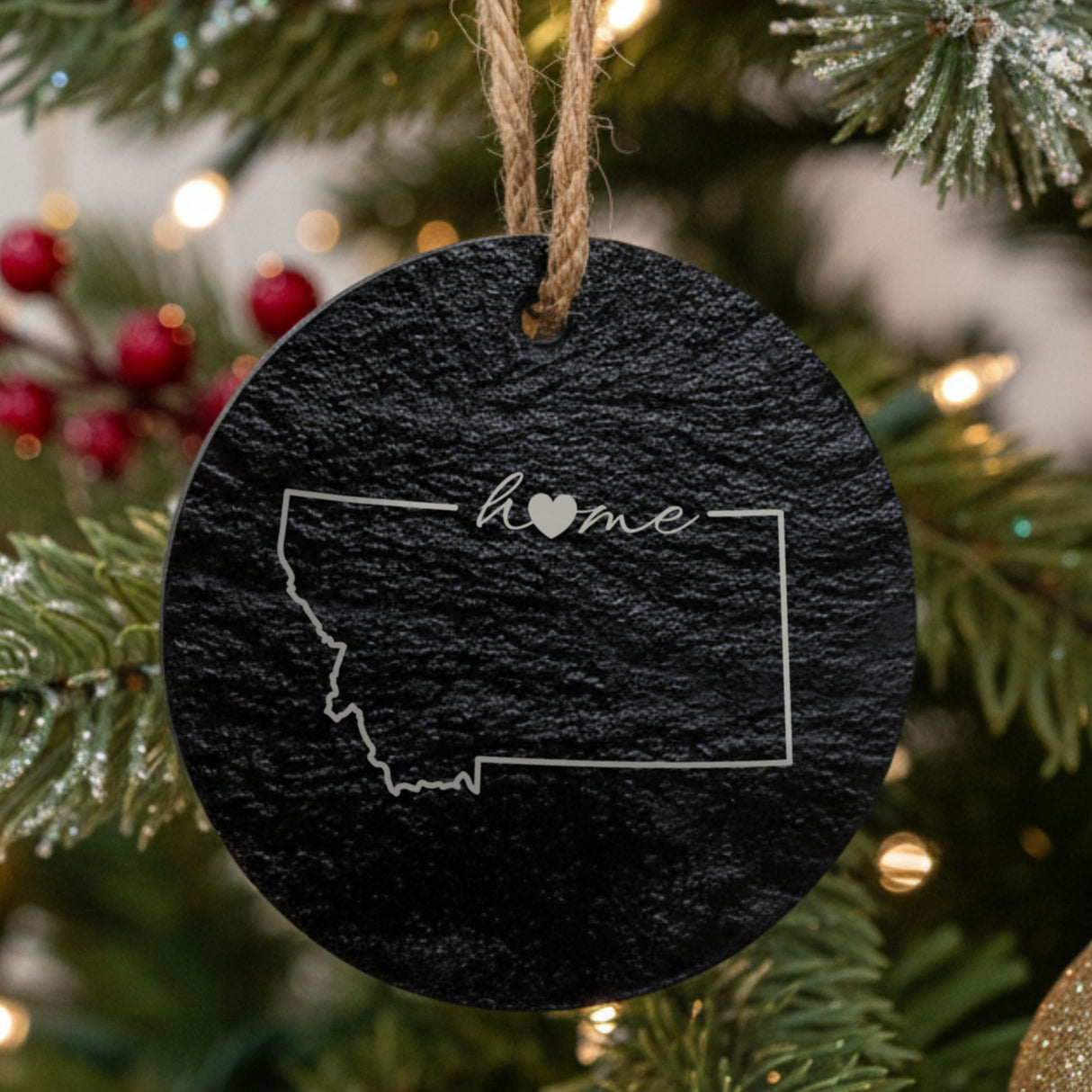 Montana round slate Christmas ornament engraved with the state outline and home in script with a heart
