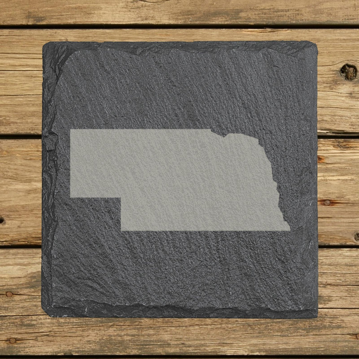 Nebraska square slate coaster with the full state shape engraved