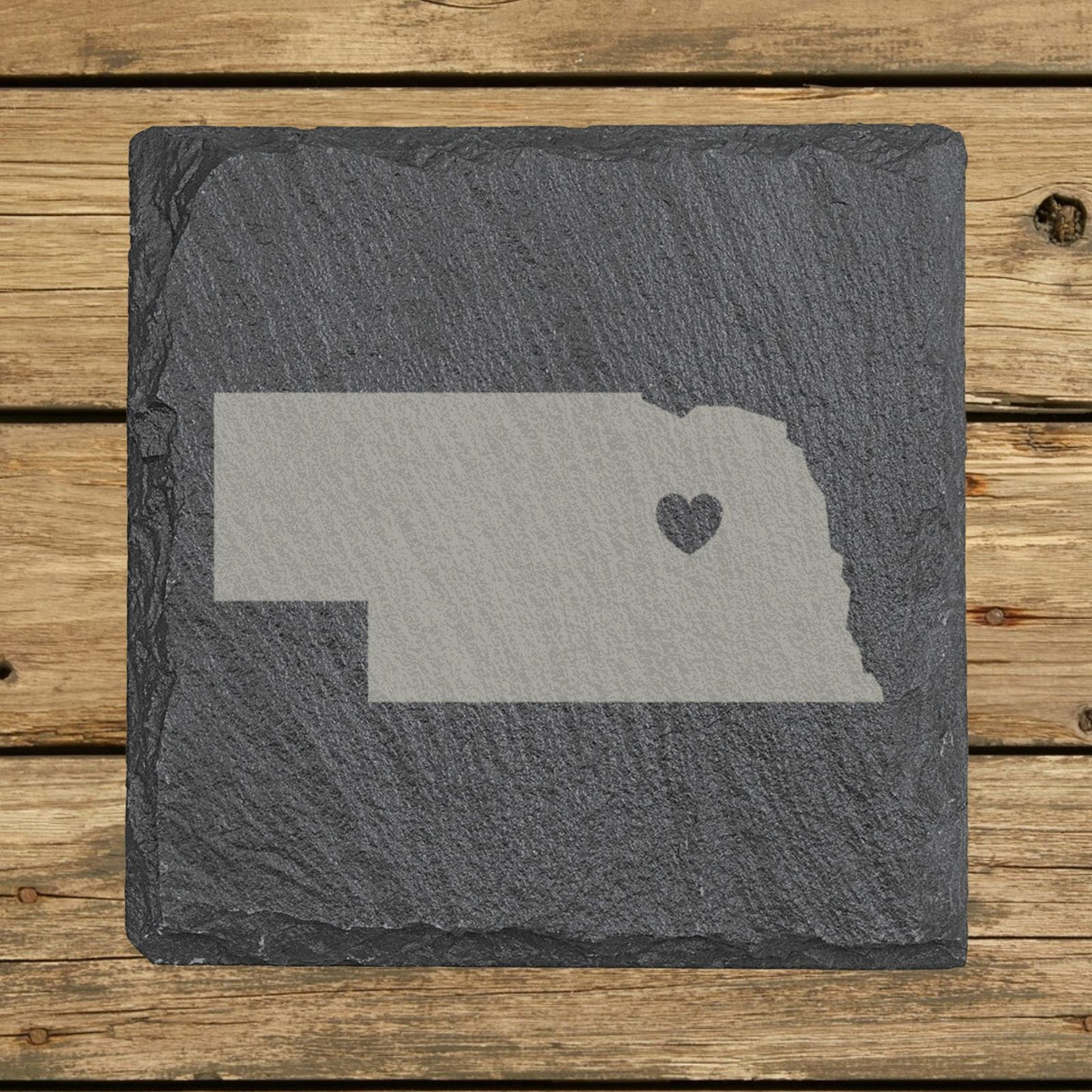 Nebraska square slate coaster engraved with the state shape and a heart