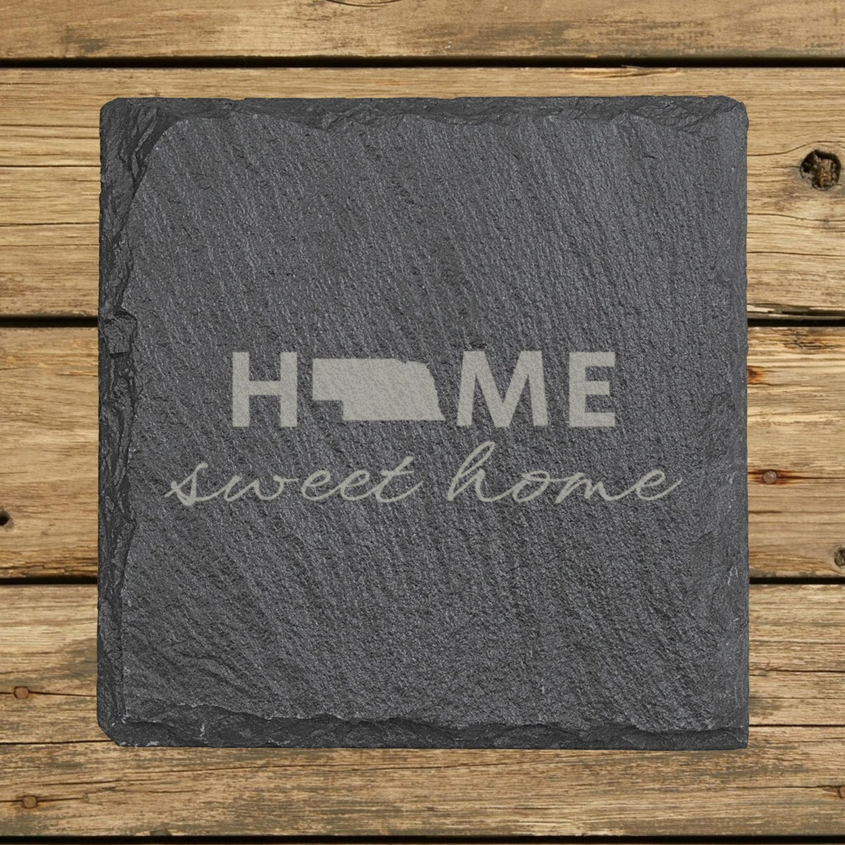 Nebraska square slate coaster engraved with HOME sweet home using the state shape as the letter O