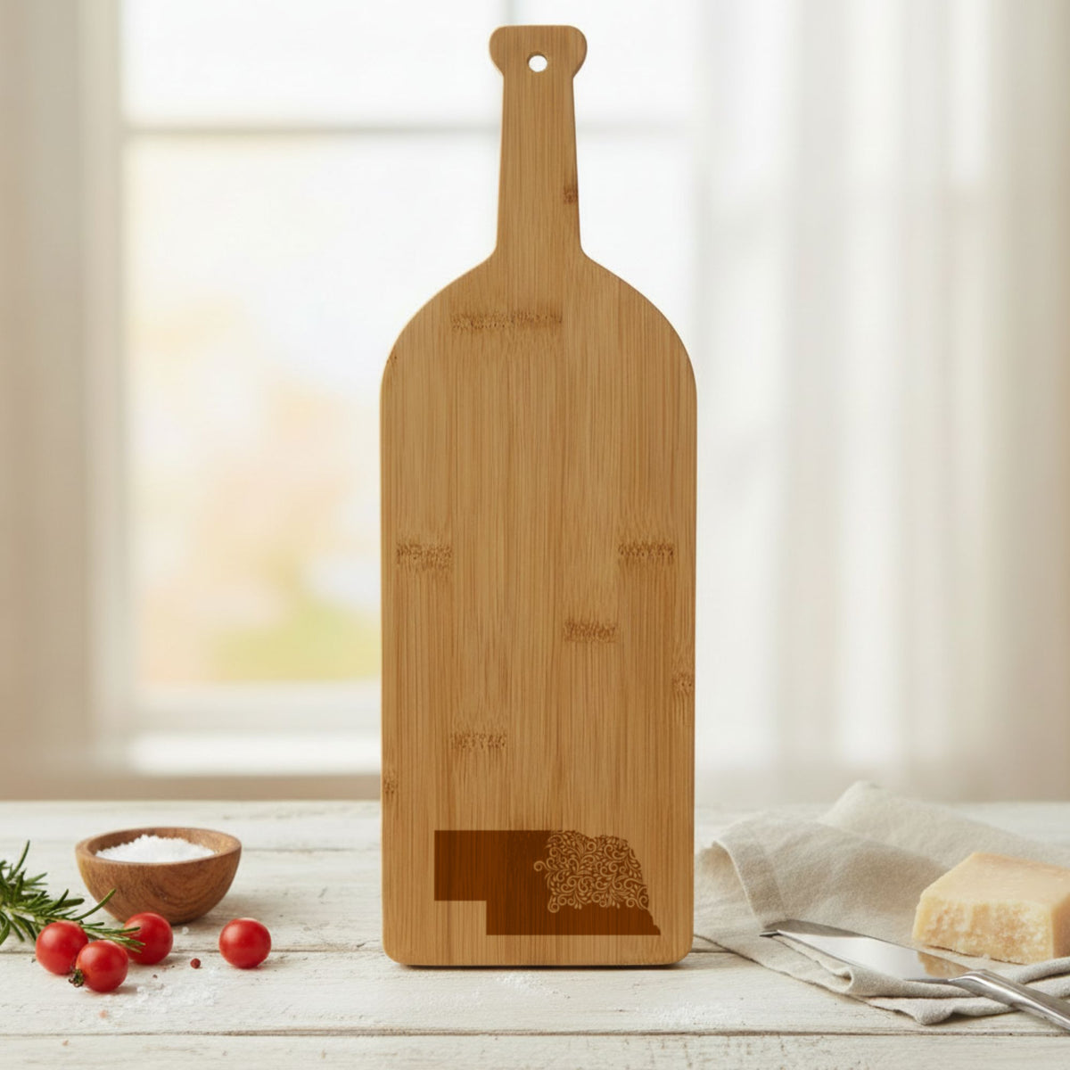 Bamboo wine bottle cutting board engraved with the Nebraska Floral Damask design