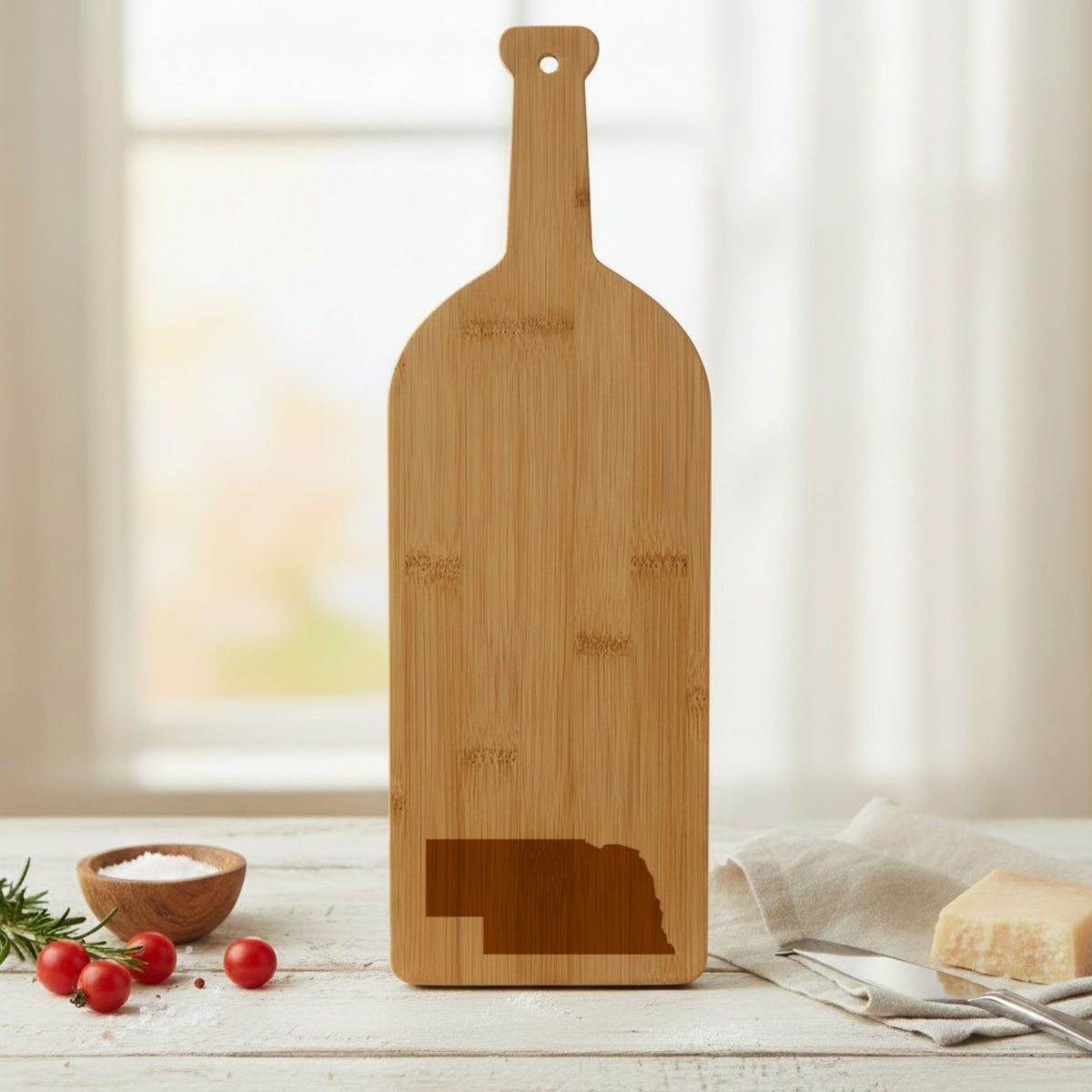 Bamboo wine bottle cutting board engraved with the Nebraska Engraved State design