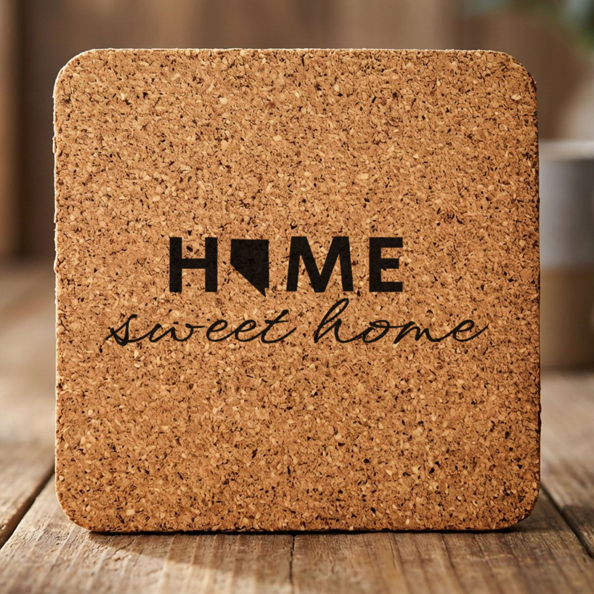 Nevada square cork coaster engraved with HOME sweet home using the state shape as the letter O