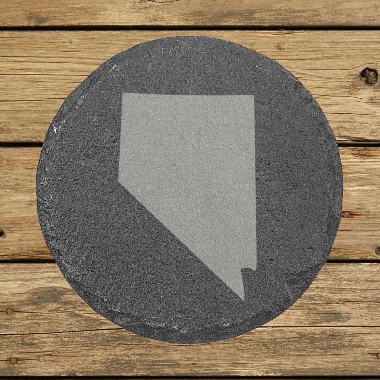 Nevada round slate coaster with the full state shape engraved