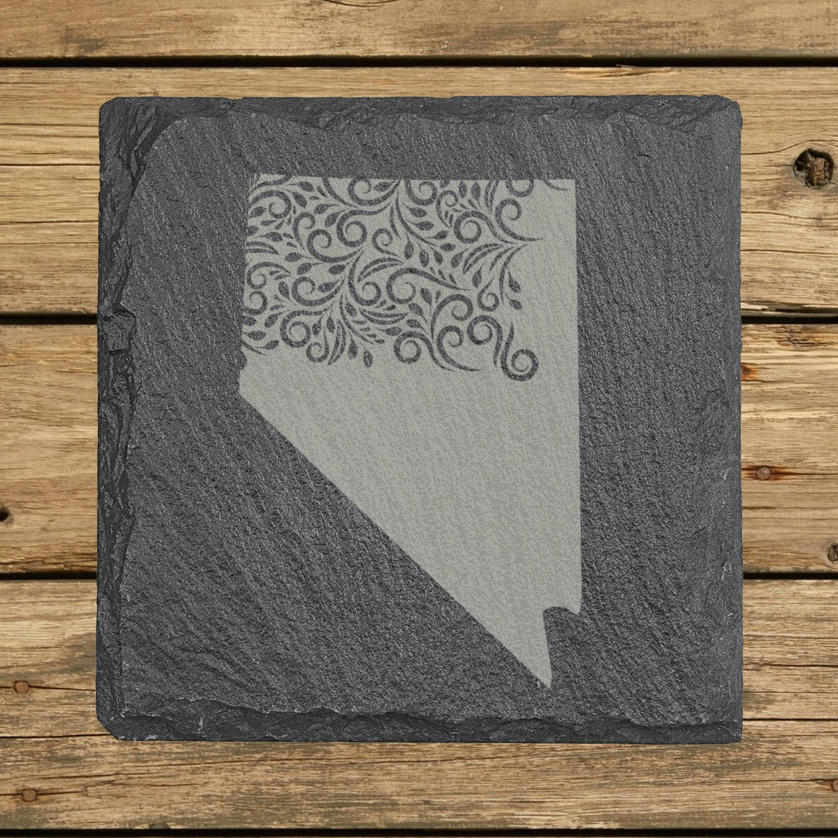 Nevada square slate coaster engraved with the state shape in ornate floral scrollwork