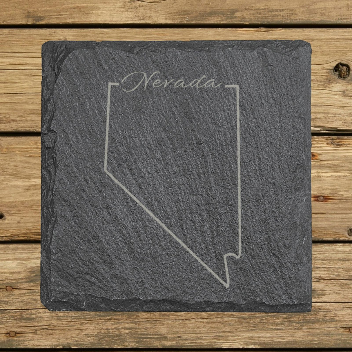 Nevada square slate coaster engraved with the state outline and Nevada in script lettering