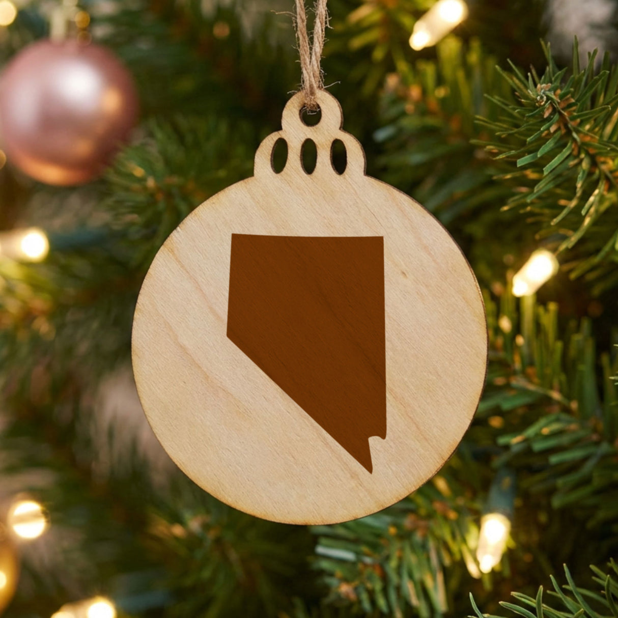 Nevada round wood Christmas ornament with the full state shape engraved