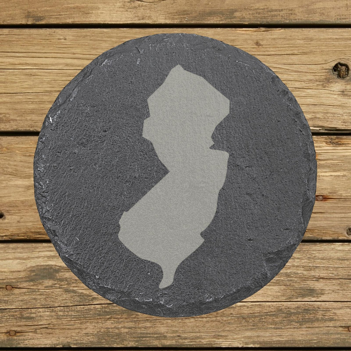 New Jersey round slate coaster with the full state shape engraved