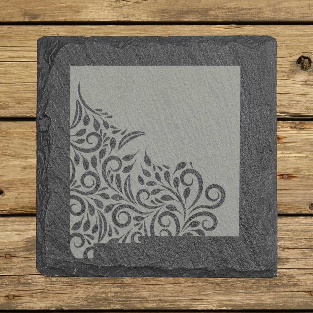 New Mexico square slate coaster engraved with the state shape in ornate floral scrollwork