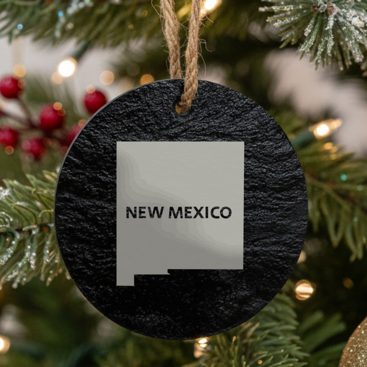 New Mexico round slate Christmas ornament engraved with the state shape and NEW MEXICO in bold lettering