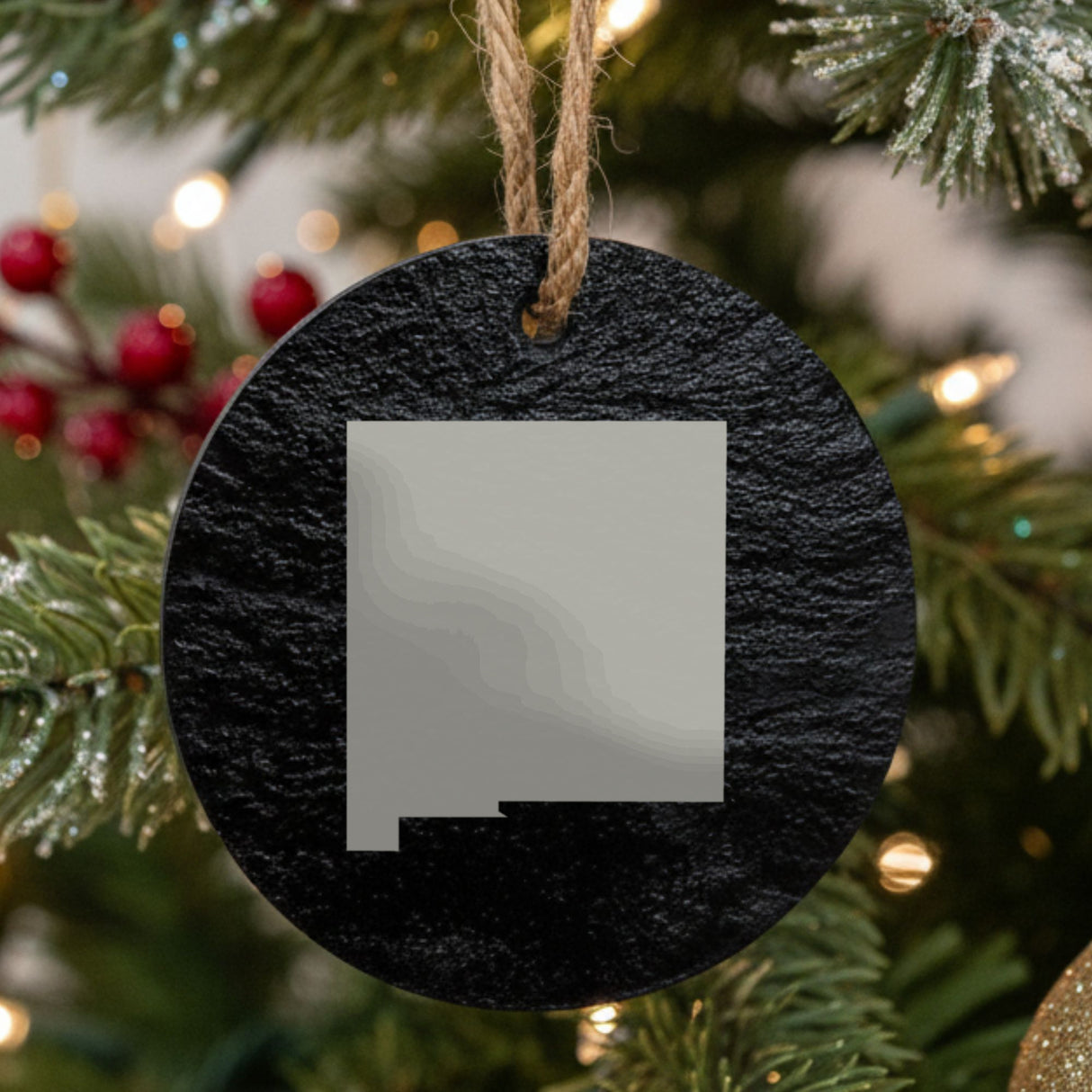 New Mexico round slate Christmas ornament with the full state shape engraved