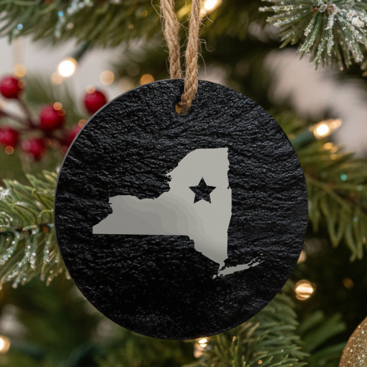 New York round slate Christmas ornament engraved with the state shape and a star