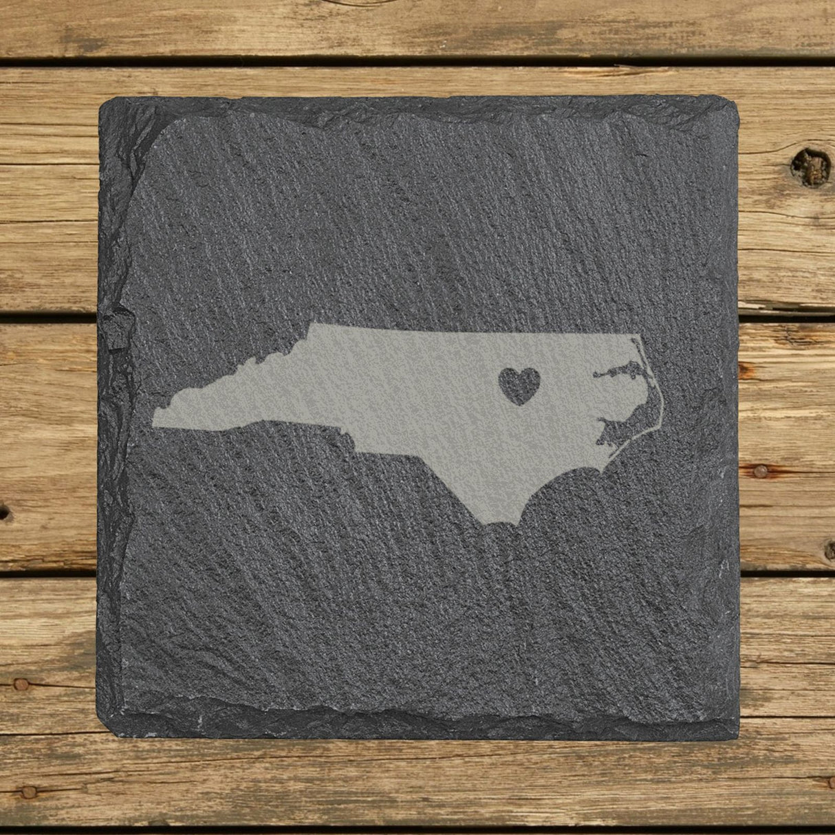 North Carolina square slate coaster engraved with the state shape and a heart