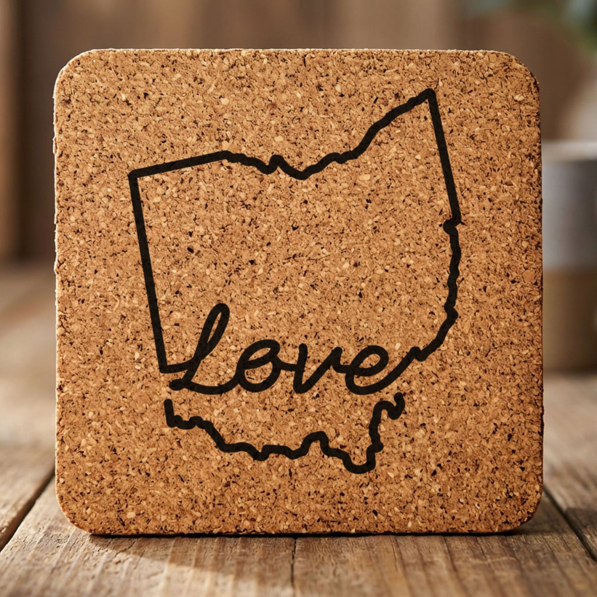Ohio square cork coaster engraved with a hand-drawn state outline and love in cursive