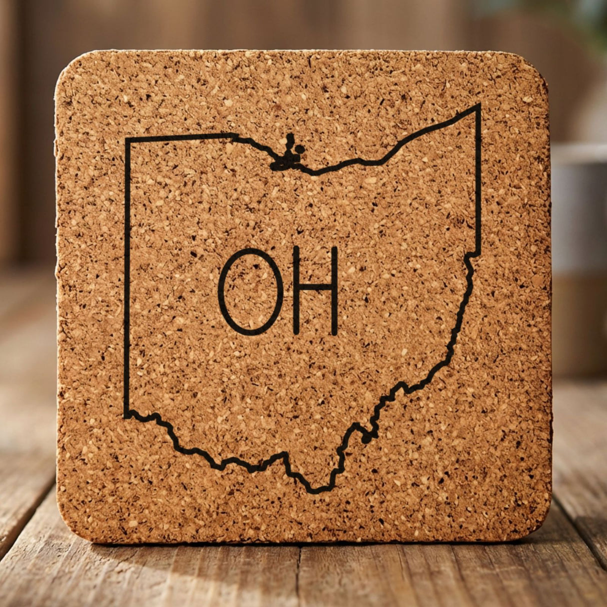 Ohio square cork coaster engraved with the state outline and OH initials
