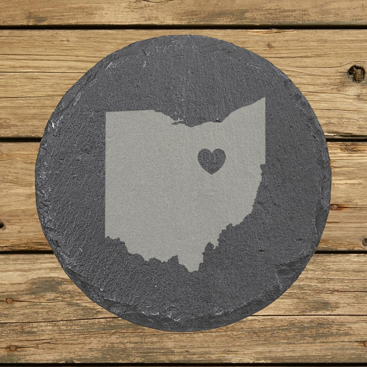 Ohio round slate coaster engraved with the state shape and a heart
