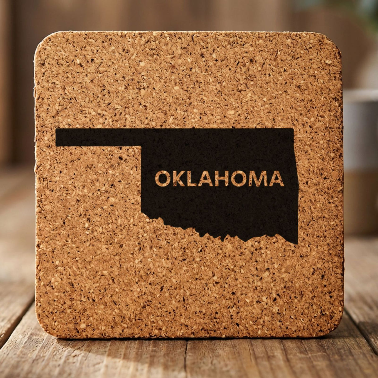 Oklahoma square cork coaster engraved with the state shape and OKLAHOMA in bold lettering