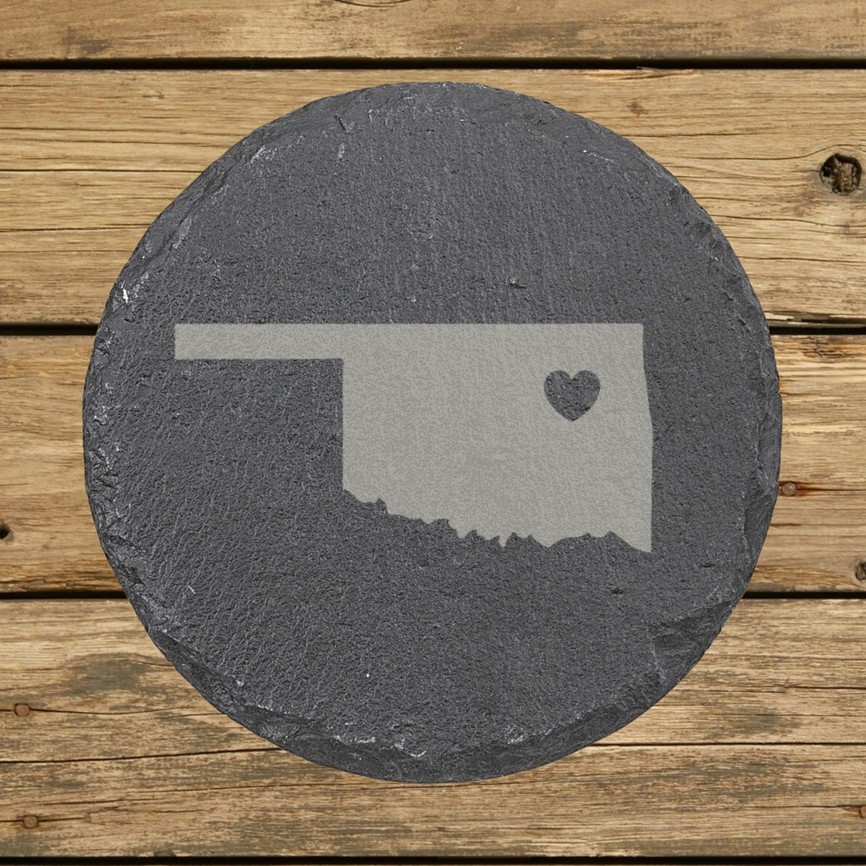 Oklahoma round slate coaster engraved with the state shape and a heart