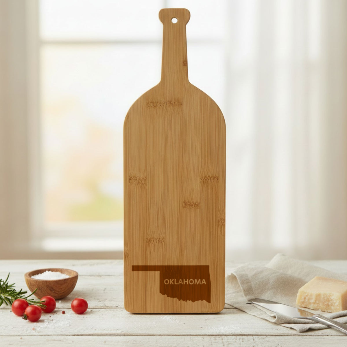 Bamboo wine bottle cutting board engraved with the Oklahoma Bold State Name design