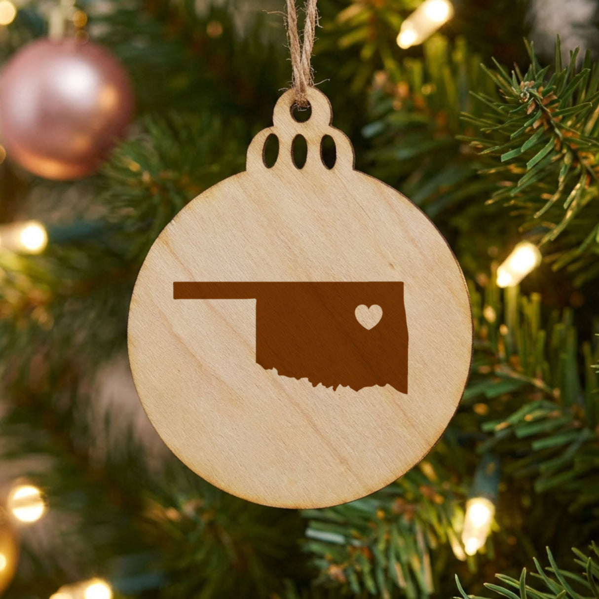 Oklahoma round wood Christmas ornament engraved with the state shape and a heart
