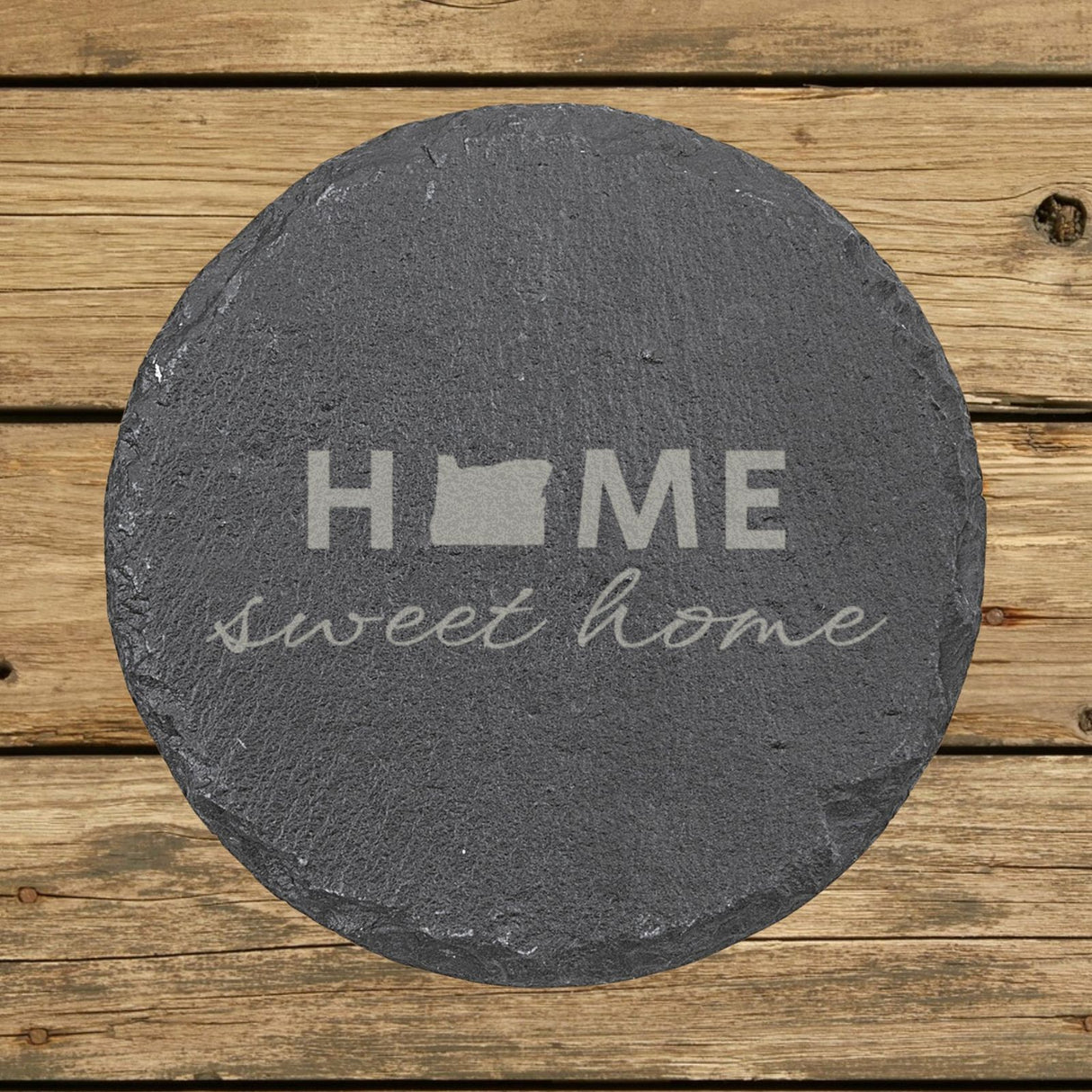 Oregon round slate coaster engraved with HOME sweet home using the state shape as the letter O