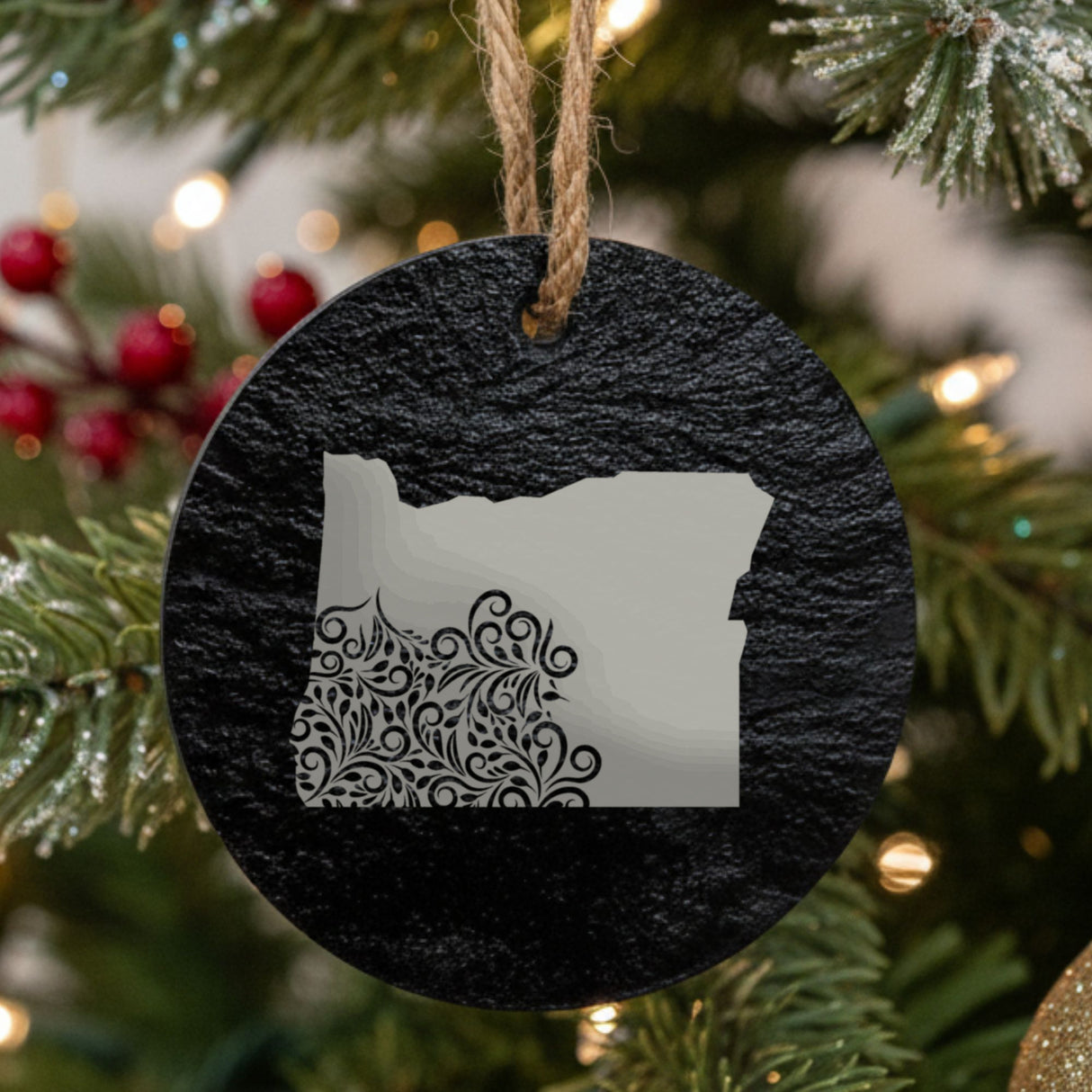 Oregon round slate Christmas ornament engraved with the state shape in ornate floral scrollwork