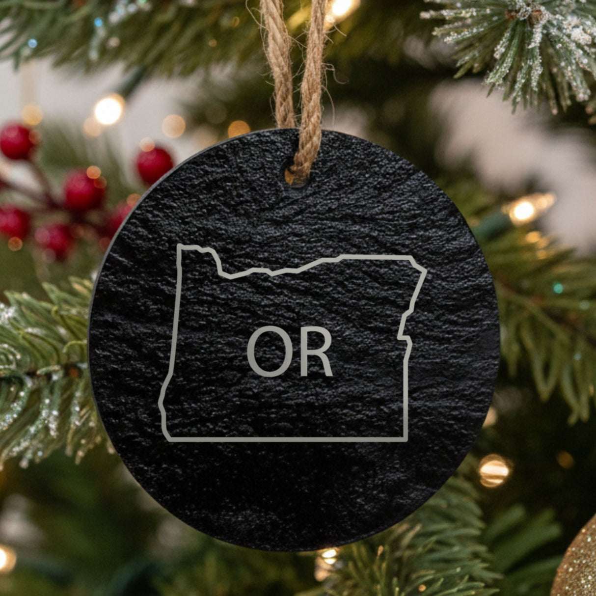 Oregon round slate Christmas ornament engraved with the state outline and OR initials