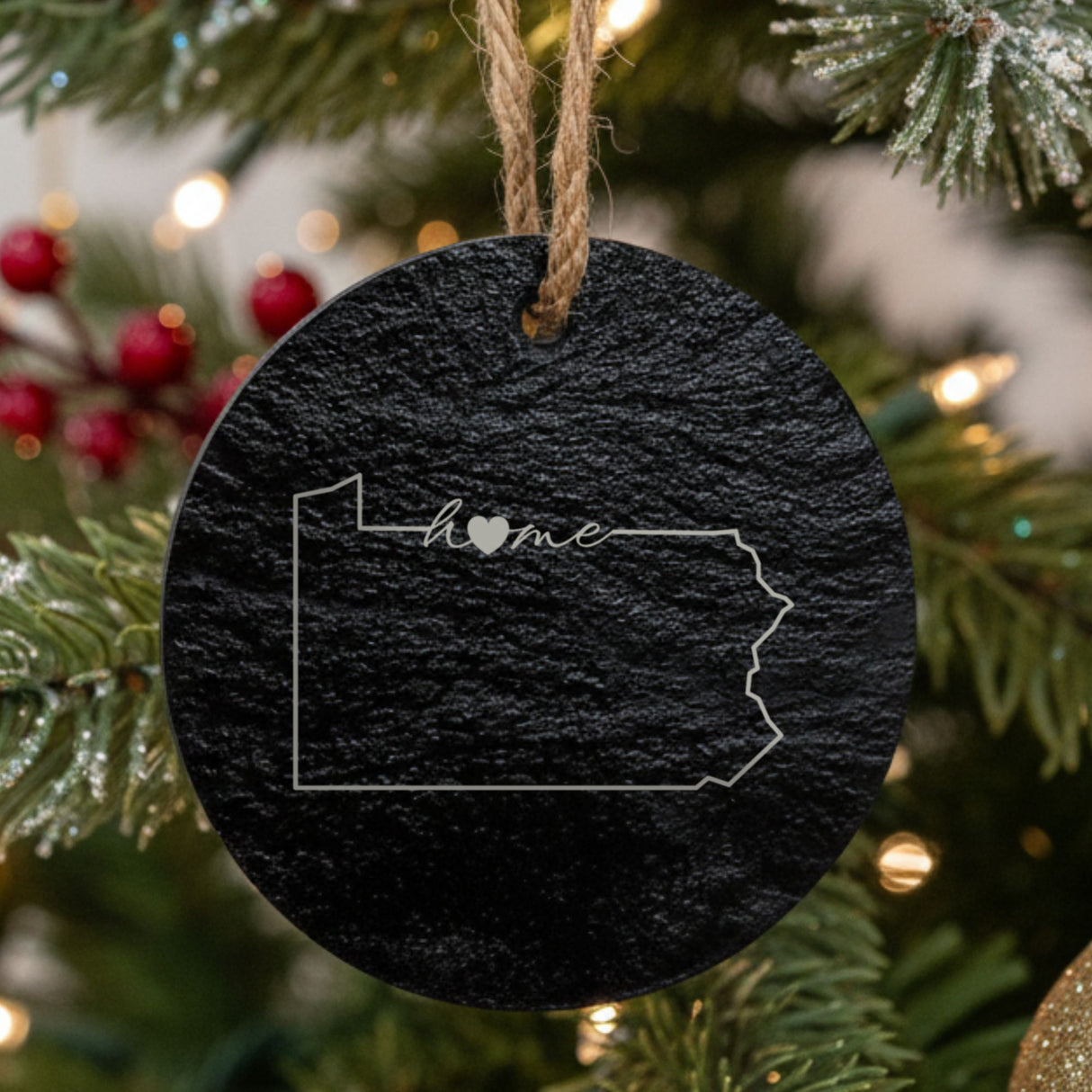 Pennsylvania round slate Christmas ornament engraved with the state outline and home in script with a heart
