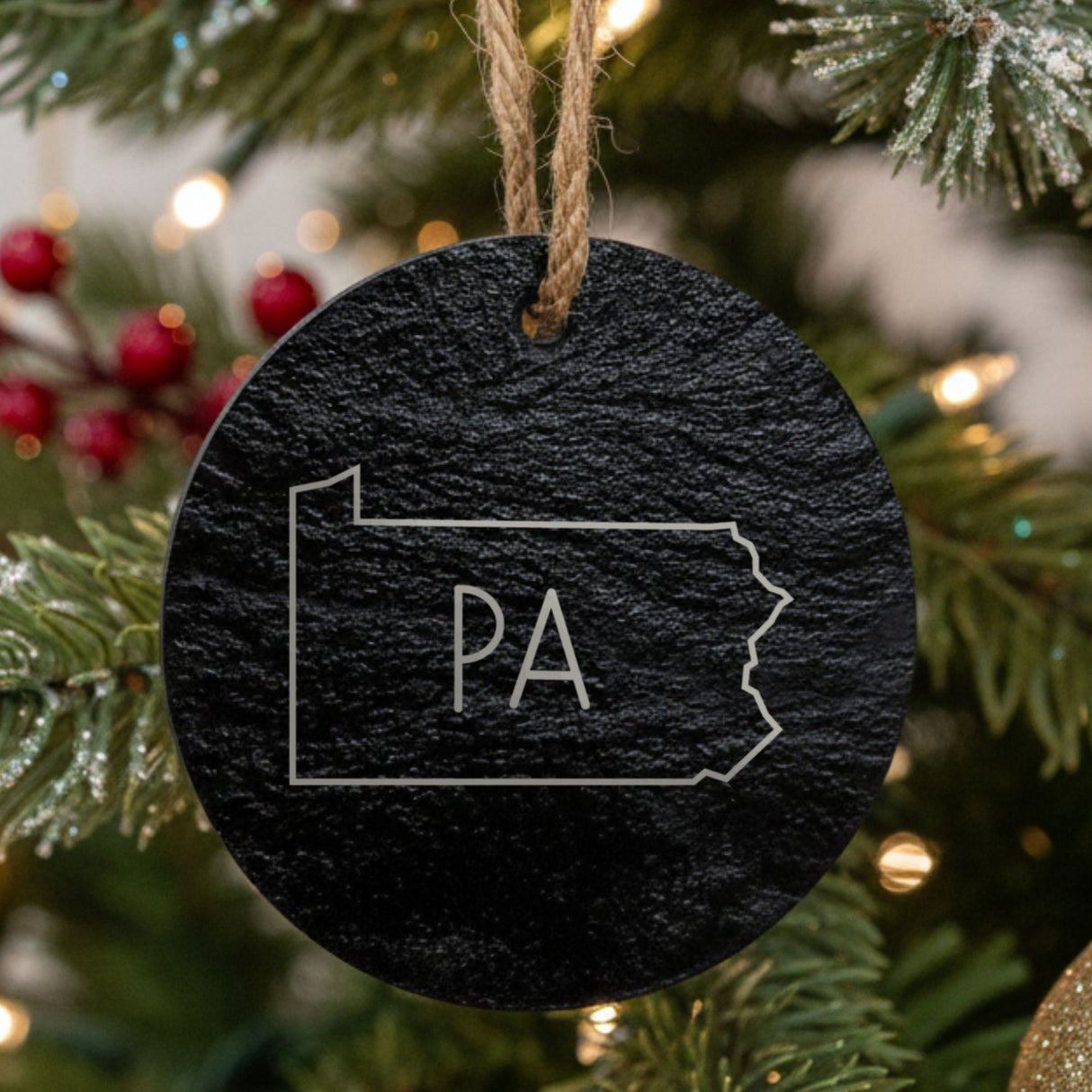 Pennsylvania round slate Christmas ornament engraved with the state outline and PA initials