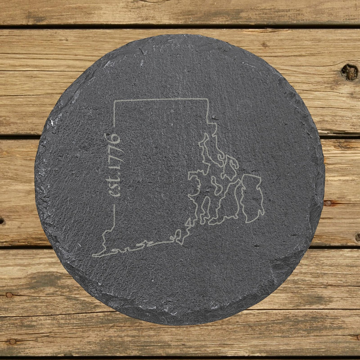 Rhode Island round slate coaster engraved with the state outline and est. 1776