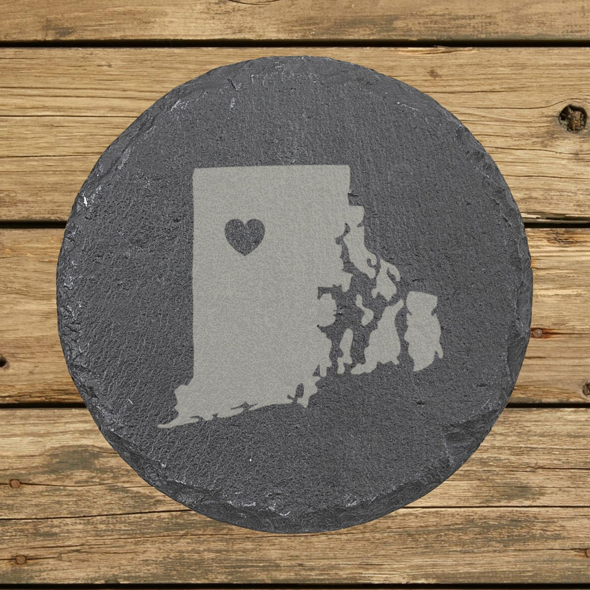 Rhode Island round slate coaster engraved with the state shape and a heart
