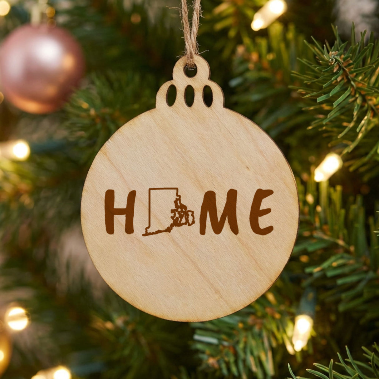 Rhode Island round wood Christmas ornament engraved with HOME using the state outline as the letter O