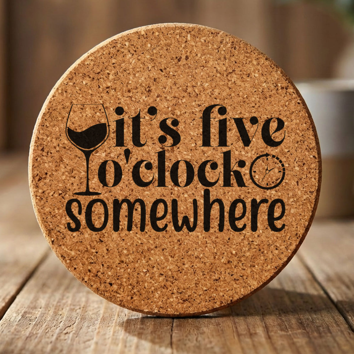 Round cork coaster laser engraved with "It's Five O'Clock Somewhere"