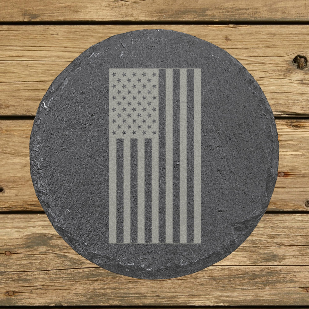 Round slate coaster laser engraved with an American flag, vertical design