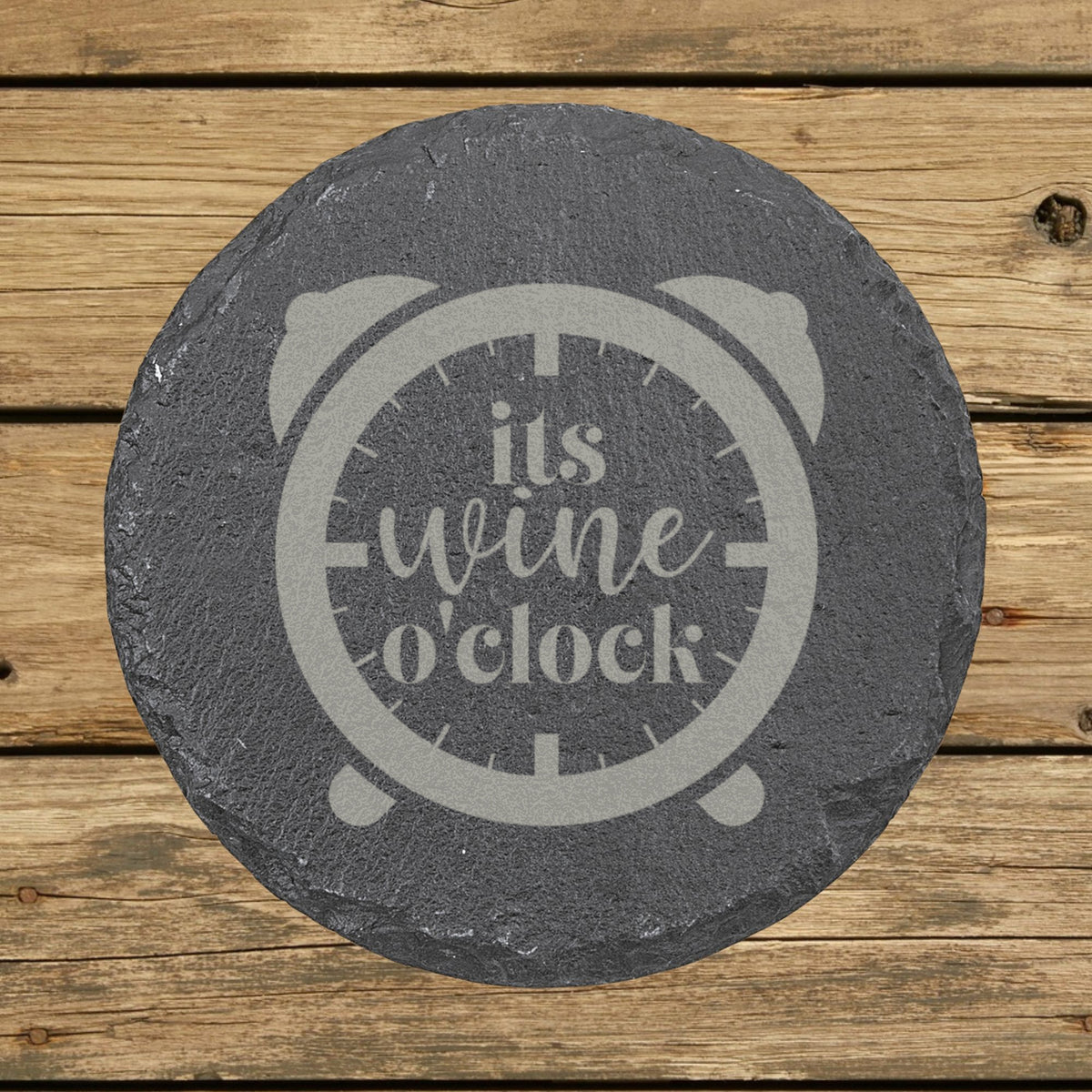 Round slate coaster laser engraved with "It's Wine O'Clock"