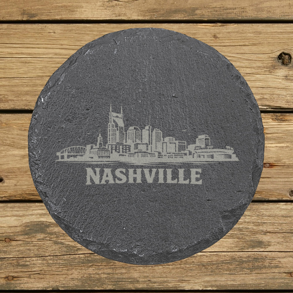 Round slate coaster laser engraved with the Nashville, Tennessee skyline