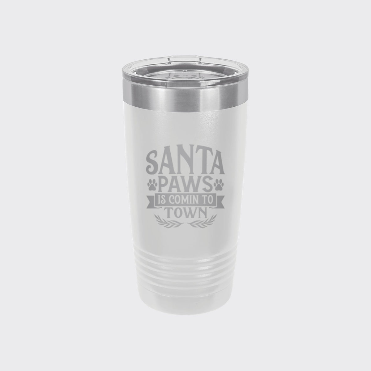 White 20 oz tumbler laser engraved with "Santa Paws Is Comin' to Town"