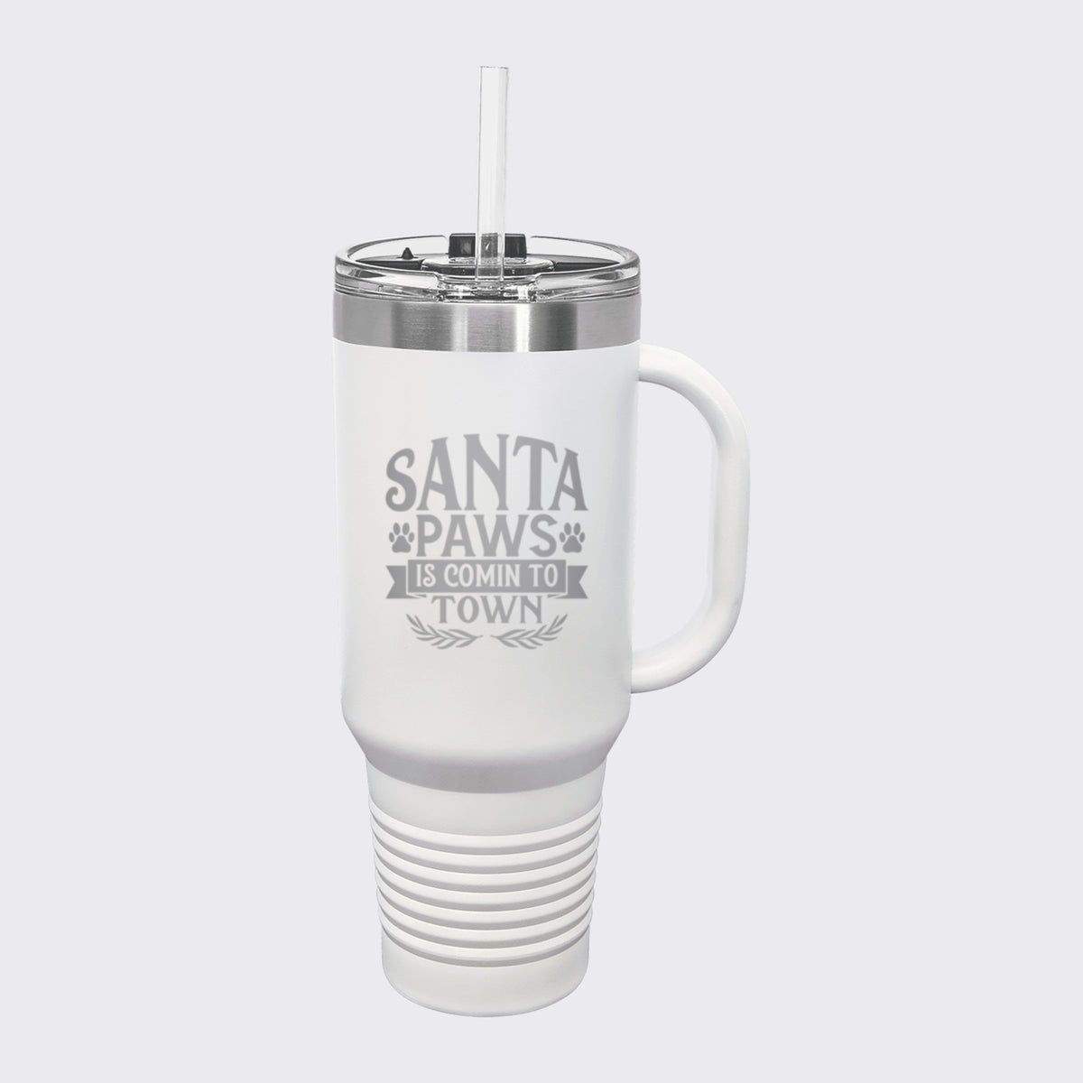 White 40 oz tumbler with handle and straw laser engraved with "Santa Paws Is Comin' to Town"